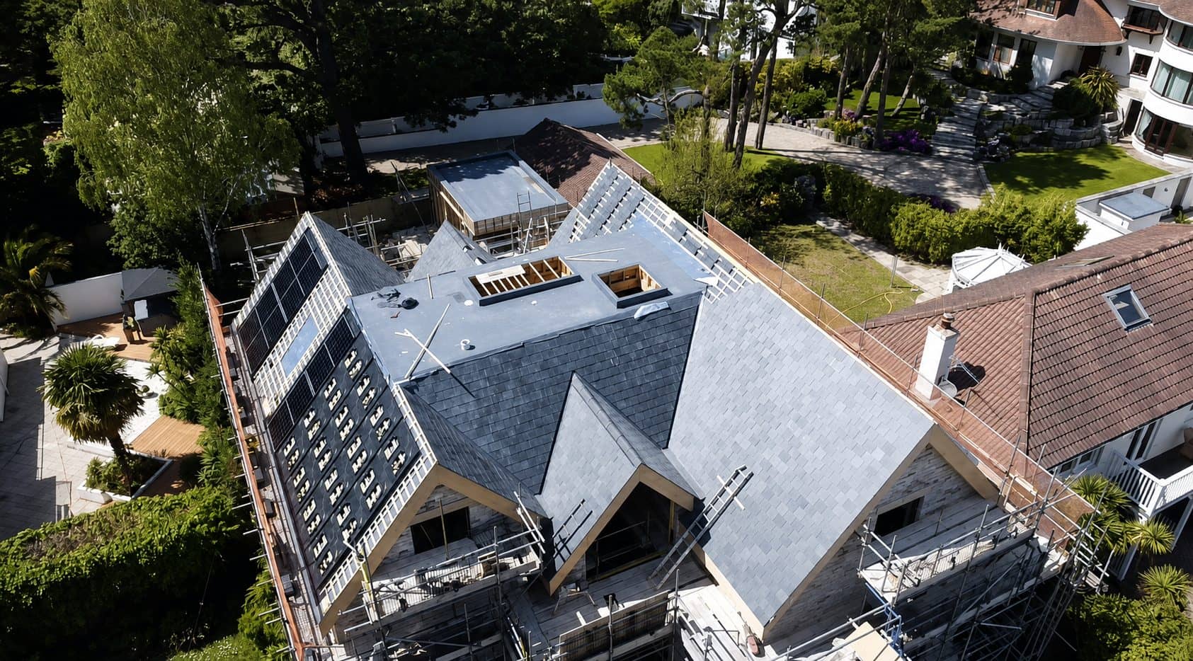 Aerial view of a large slate-roofed property